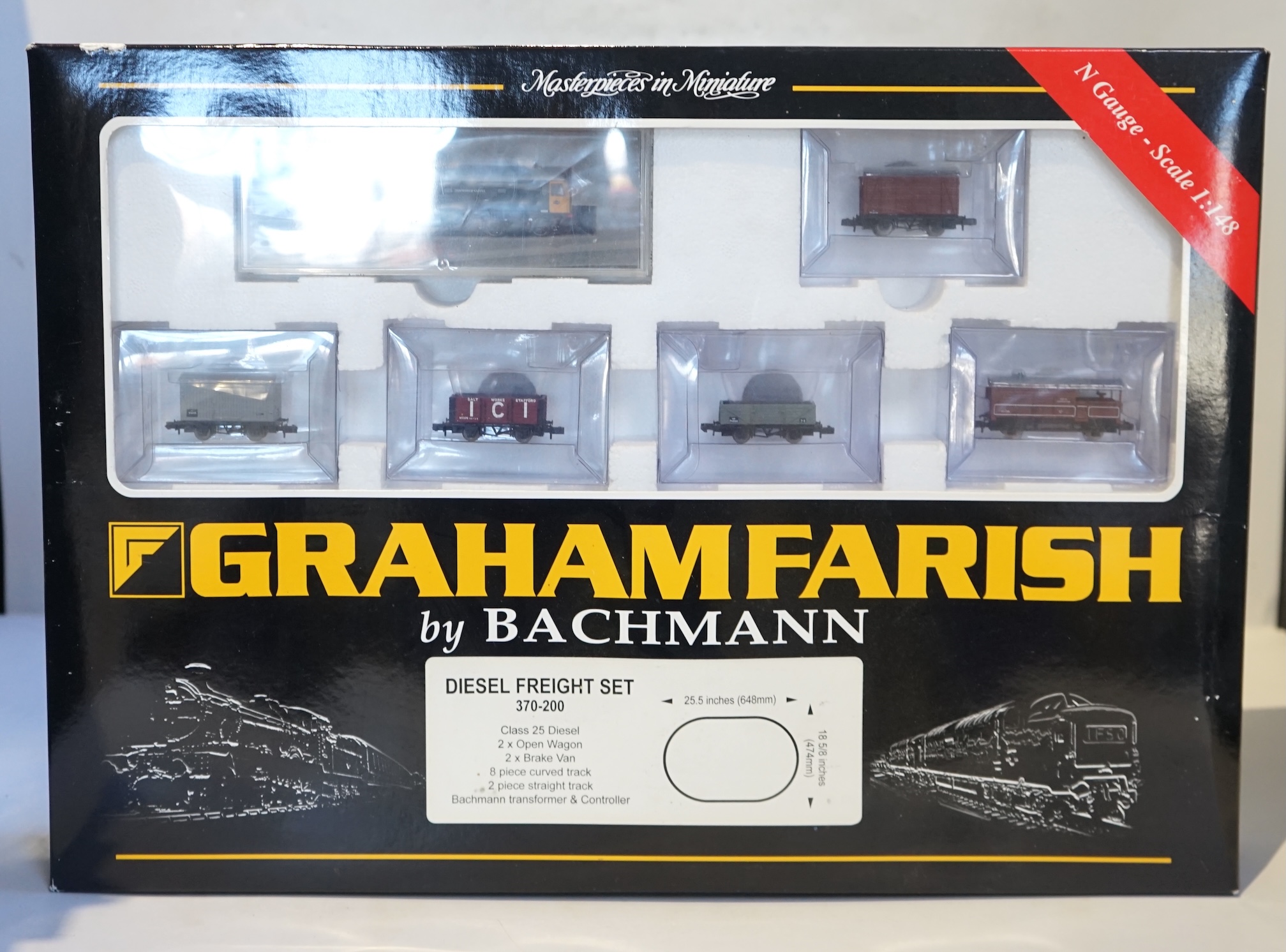 Four boxed Graham Farish N gauge railway train sets; a Diesel Freight set, comprising a Class 25 diesel locomotive and five freight wagons, together with a J94 Freight set with three wagons (370-050), a Queen Elizabeth G